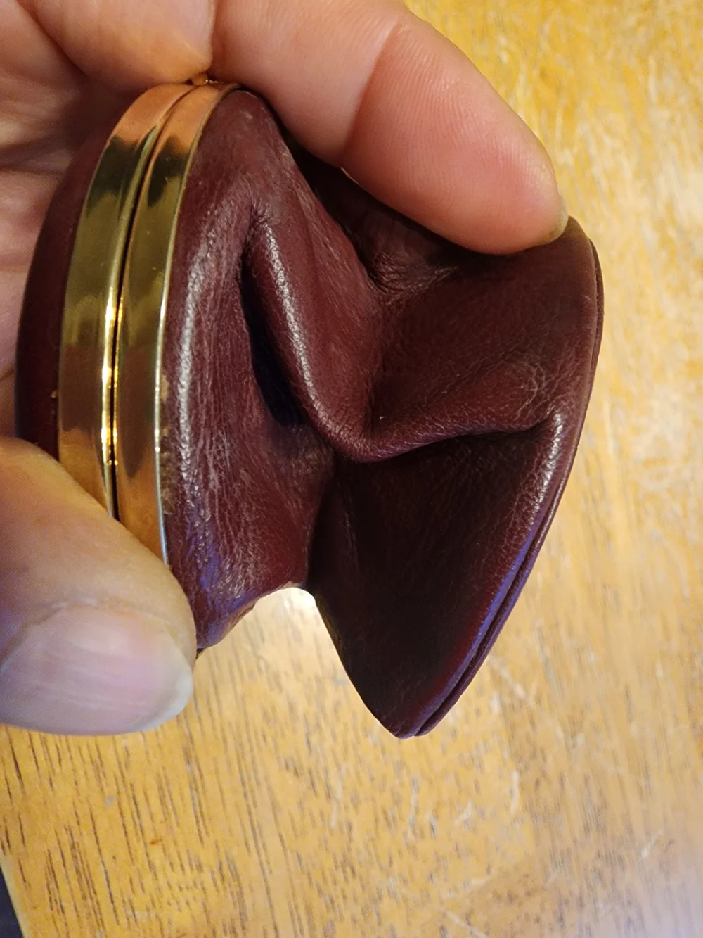 vintage Christian Dior maroon leather kiss-lock coin purse embossed Logo